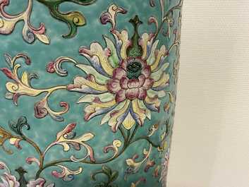 A large Chinese famille rose cylindrical vase with applied lotus scrolls, Jiaqing/Daoguang